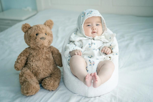 抚州宝宝吐奶是什么原因